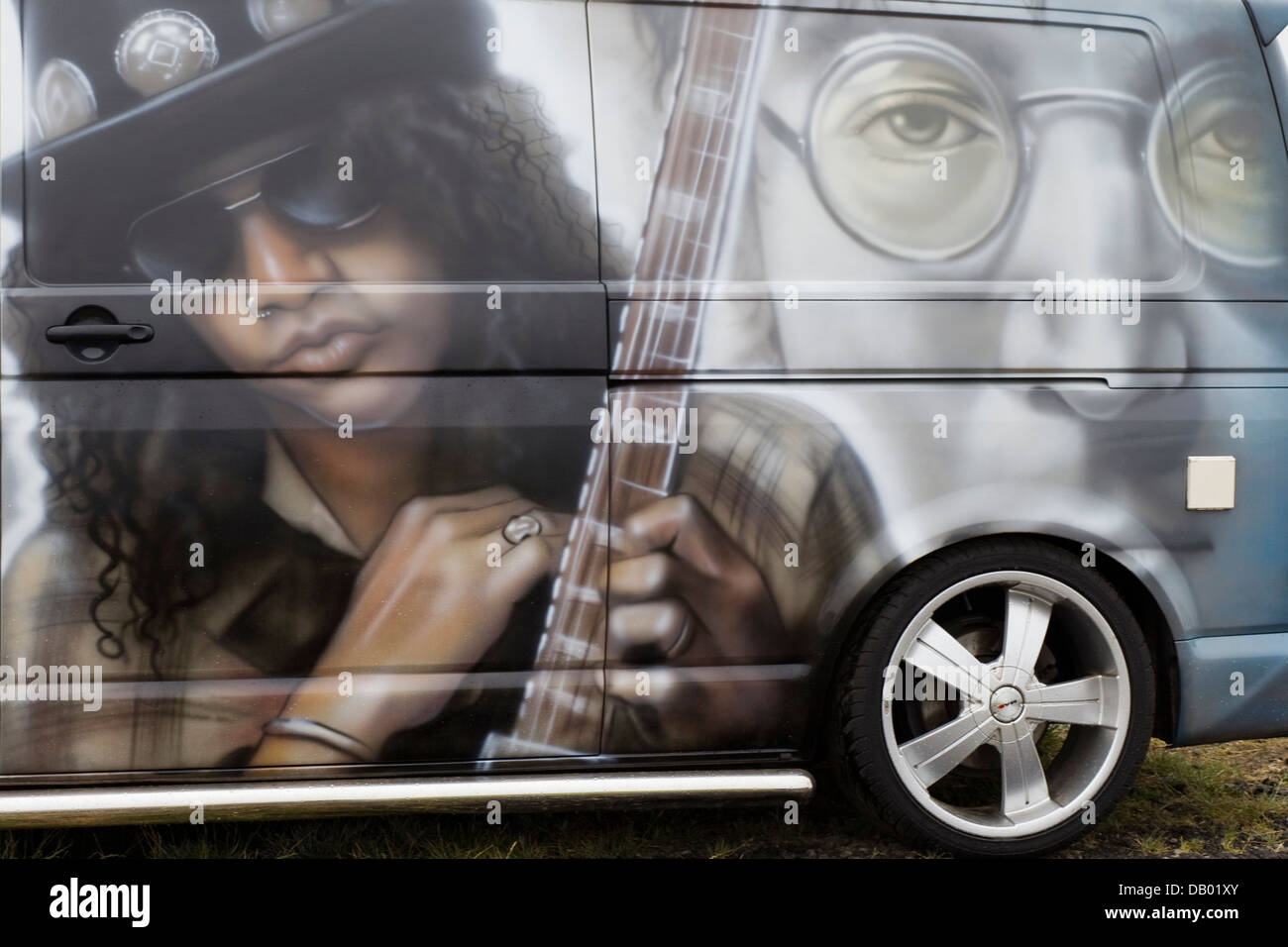 Custom painted VW Camper van with Slash "Saul Hudson" and John Lennon  painted on the side Stock Photo - Alamy