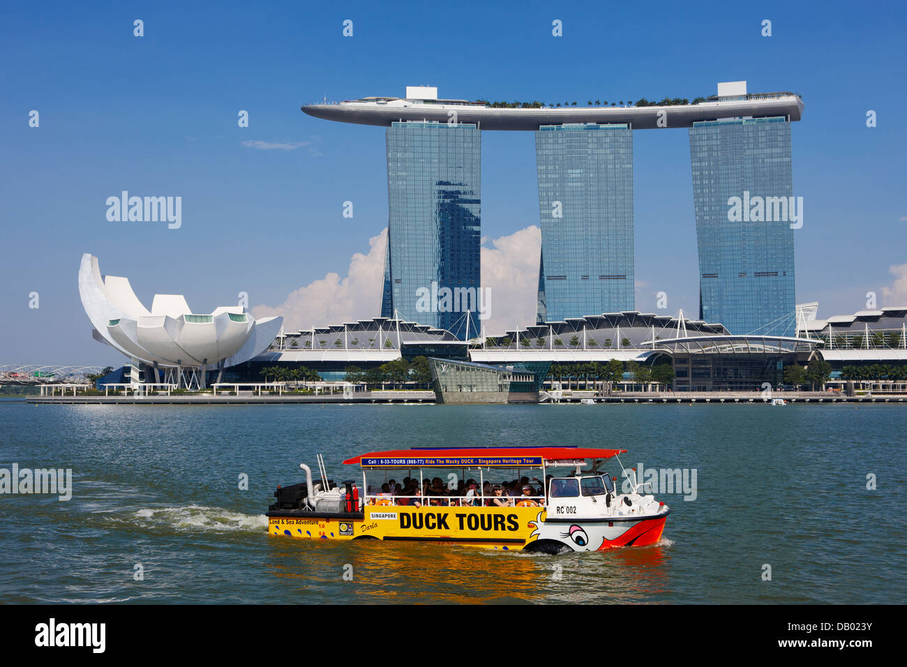 Duck Tours amphibious vehicle passing by Marina Bay Sands Hotel in
