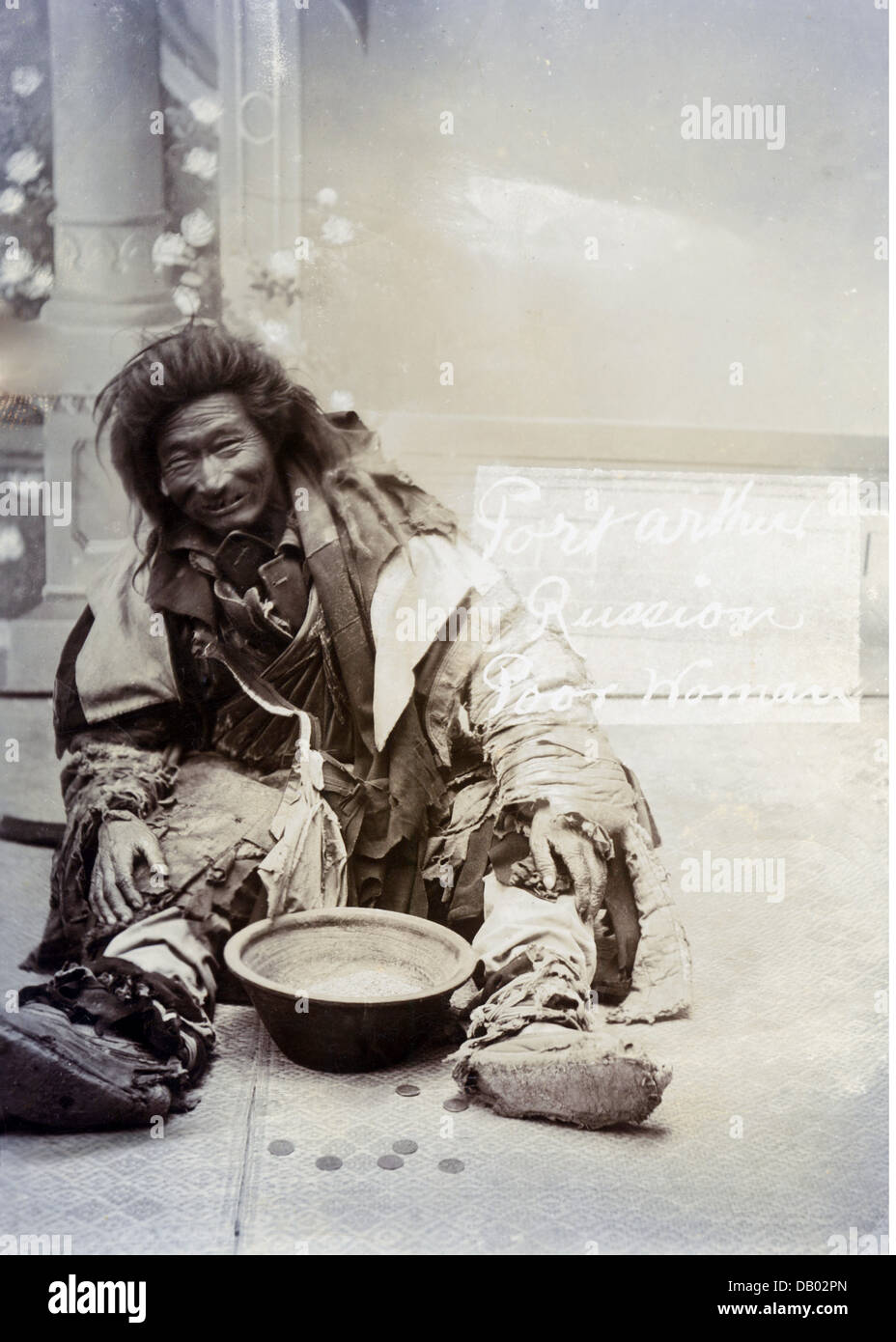 Gypsy beggar with a Russian child Gypsy beggar with a Russian child