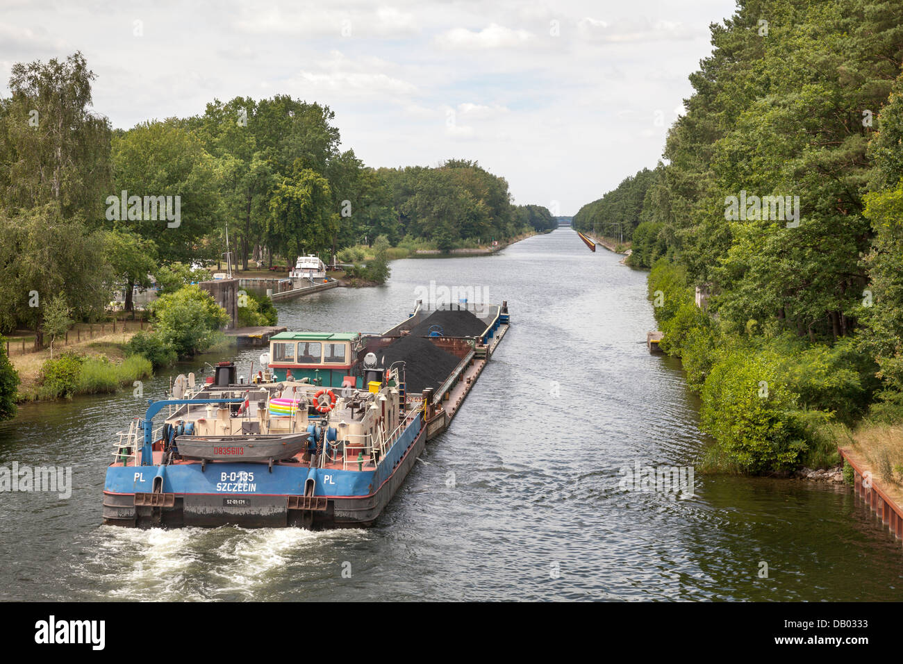 Coal being transported by barge on the Oder Havel Canal, Brandenburg, Germany Stock Photo