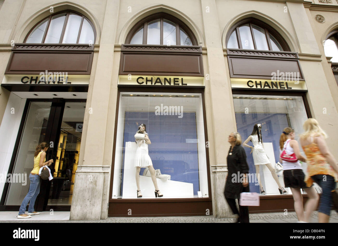 Pedestrians pass the 'Chanel' store at Maximilianstrasse in Munich