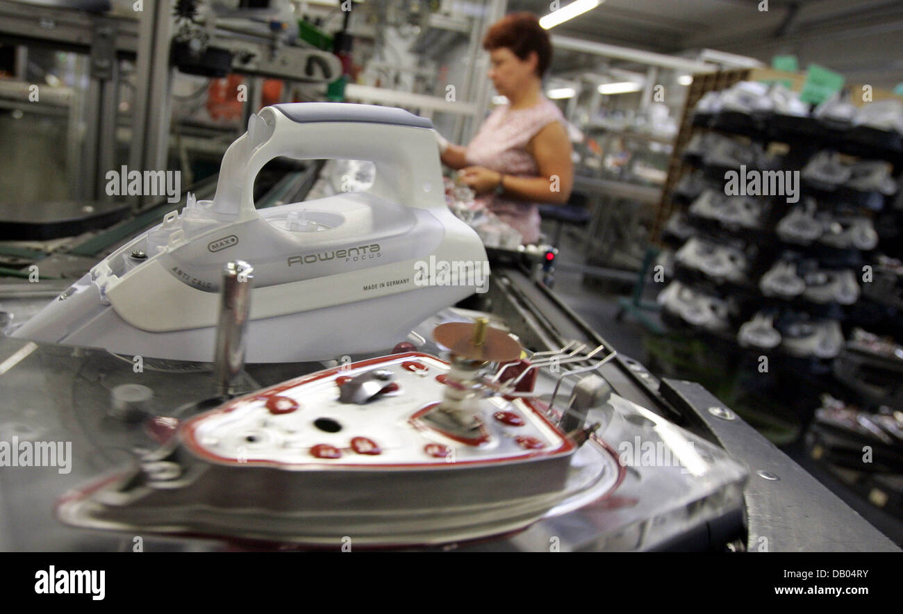 Staff of Rowenta assembles a steam iron at the company's plant in Erbach,  Germany, 15 June 2007. Household appliances poducer Rowenta produced 2.3  million steam irons in 2006 and celebrates the 50th