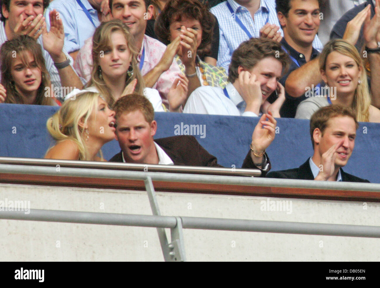 Prince William (R), Prince Harry (C) and his girlfriend Chelsy Davy (L) seen in the crowd at the charity concert in memory of Diana, Princess of Wales on what would have been her 46th birthday at Wembley Stadium, London, 1 July 2007. Photo: Hubert Boesl Stock Photo