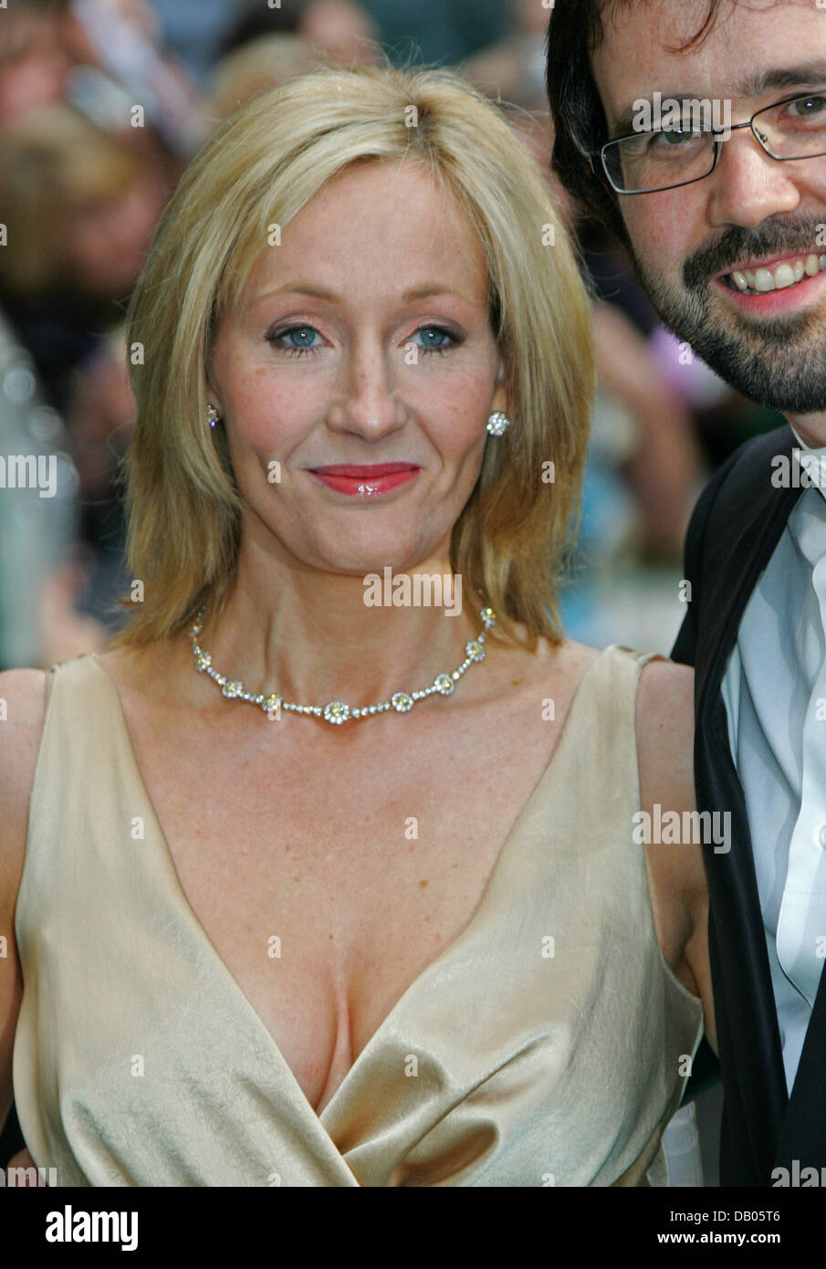 British author Joanne K. Rowling (L) and her husband Neil Murray arrive for the UK premiere of 'Harry Potter and the Order of the Phoenix' at Leicester Square in London, United Kingdom, 03 July 2007. The film based on Rowling's popular book sequel will be in cinemas on July 12th. Photo: Hubert Boesl Stock Photo