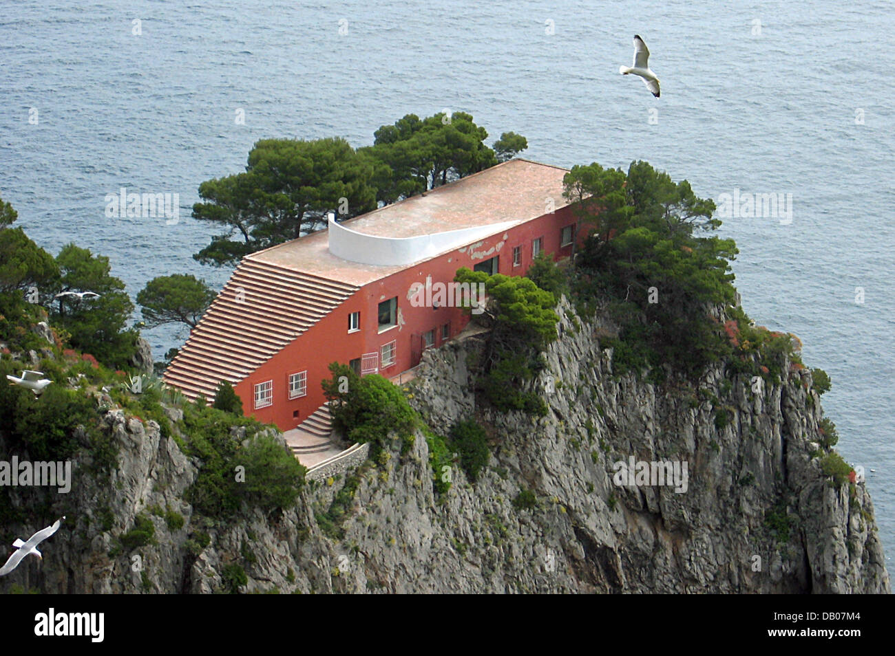 The picture shows the famous Casa Malaparte, the house of writer Curzio Malaparte, on the island of Capri, Italy, 19 May 2005. Malaparte built the villa at the Cape Massullo in the 1930ies and referred to it as 'una casa come me: triste, dura, severa' (a house of my kind: sad, hard, strict). Following year longs legal proceedings it is again in private ownership after it was willed Stock Photo
