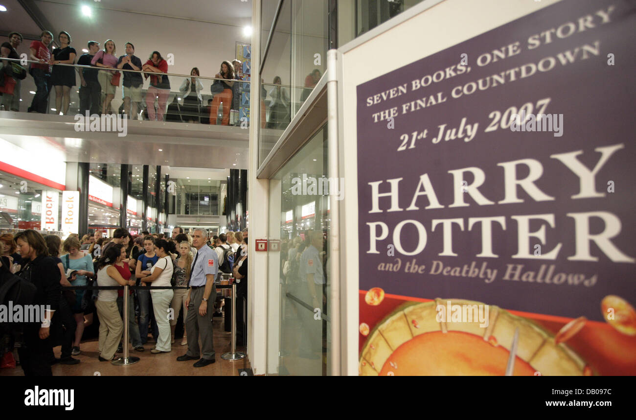 Harry Potter Fans Stand In A Long Queue Inside A Bookstore At