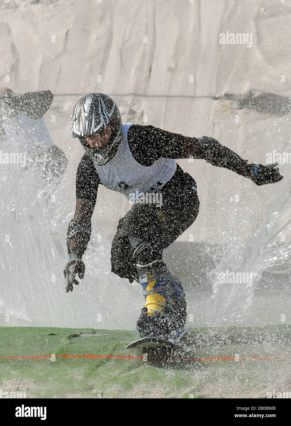 Participants in the Sanderboardercross compete at the 16th Sandboarding
