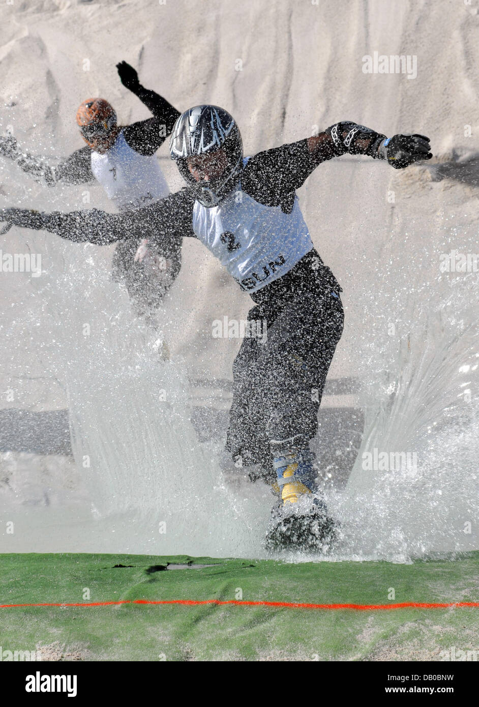 Participants in the Sanderboardercross compete at the 16th Sandboarding