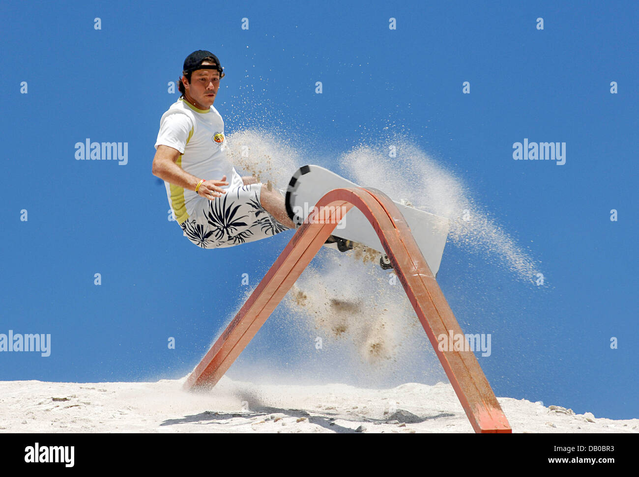 Sandpaper Slope A participant in the Sandslopestyle in action at the 16th Sandboarding ...