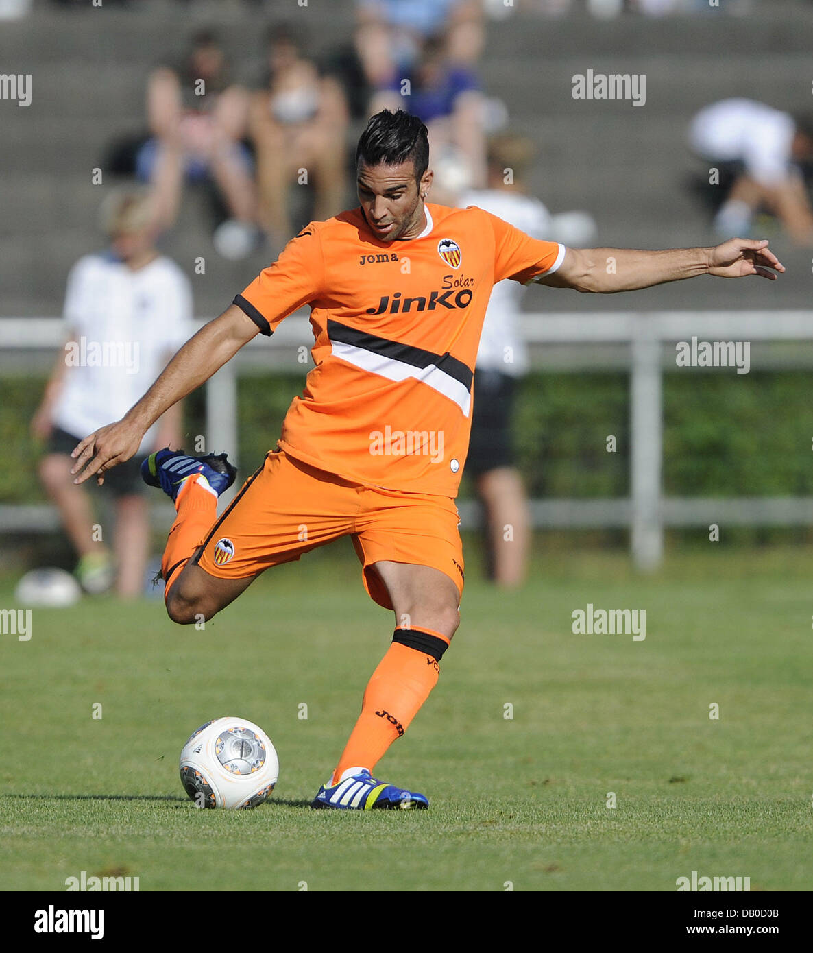Ludwigsburg, Germany. 20th July, 2013. Adil Rami of Valencia plays the ball during the test match VfB Stuttgart vs FC Valencia in the Ludwig-Jahn-Stadion in Ludwigsburg, Germany, 20 July 2013. Photo: DANIEL MAURER/dpa/Alamy Live News Stock Photo