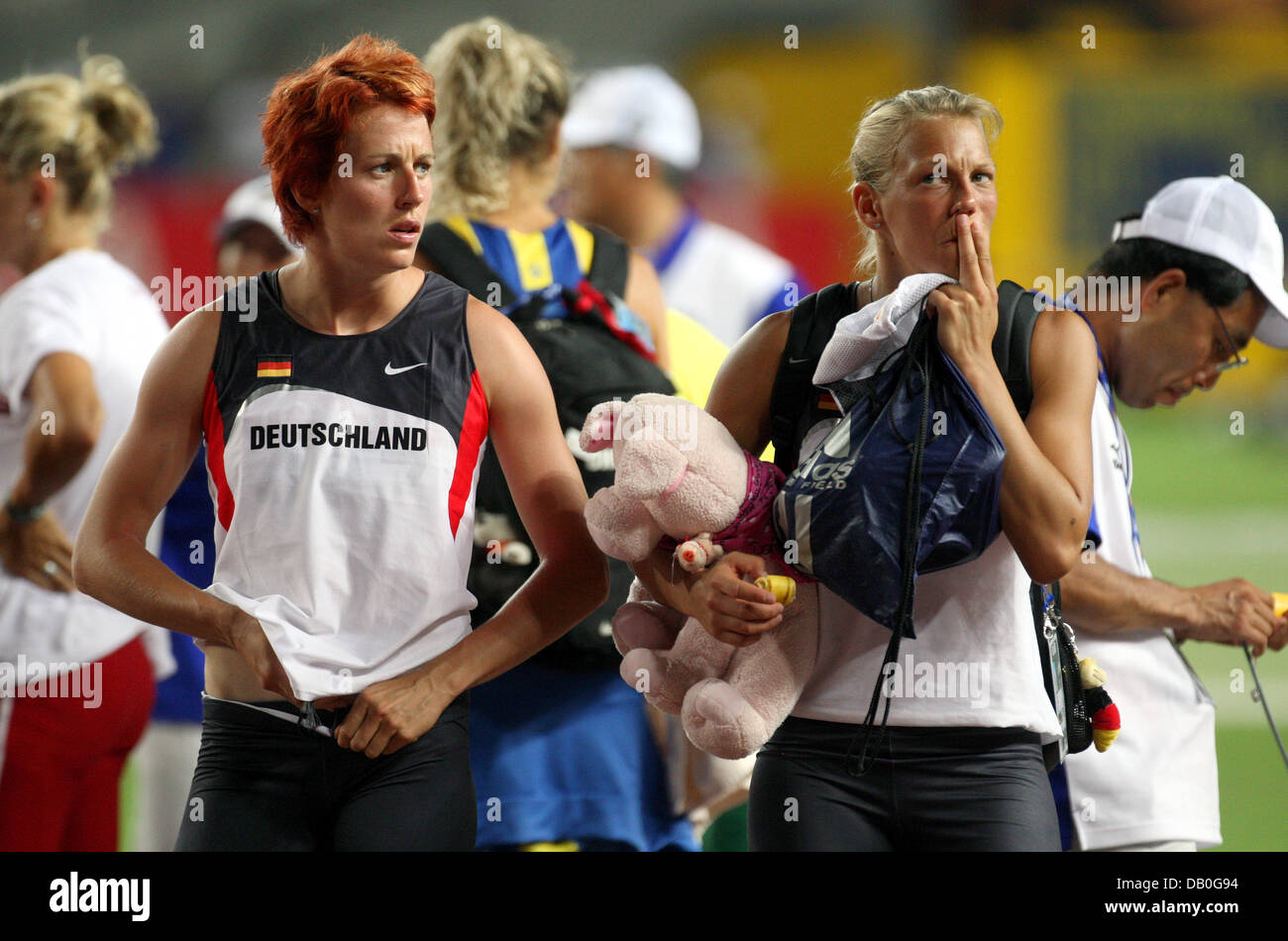 German heptathletes Sonja Kesselschlaeger (L) and Jennifer Oeser (R) pictured after the Heptahlon Shot Put of the 11th IAAF World Championships in Athletics at Nagai stadium of Osaka, Japan, 25 August 2007. Photo: Gero Breloer Stock Photo