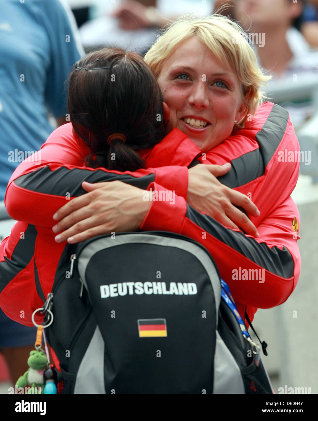 German athletes Christina Obergfoell (R) and Linda Stahl hug after they qualified for the javelin throw final at the IAAF World Championships 2007 in Osaka, Japan, 29 August 2007. Photo: Gero Breloer Stock Photo