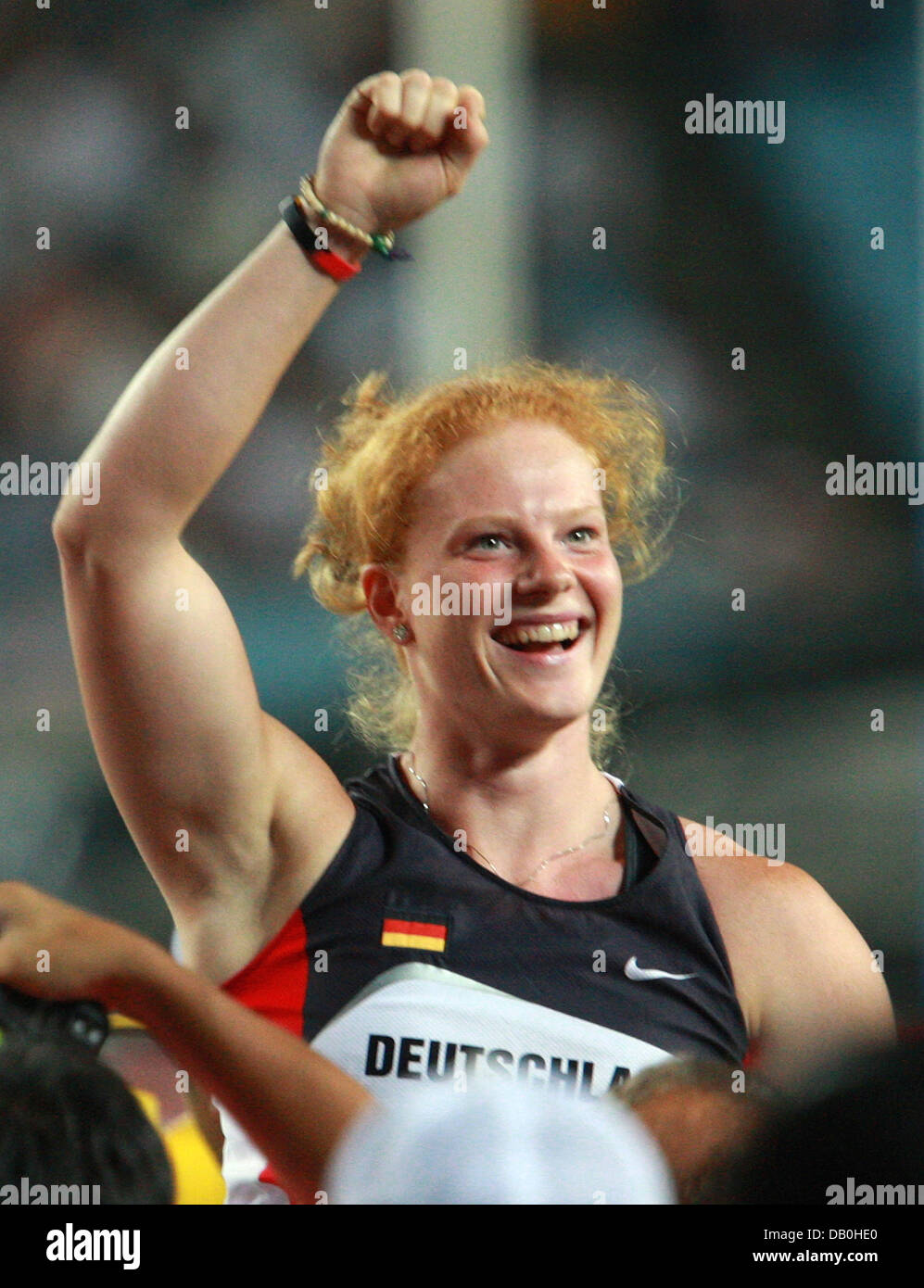 German hammer thrower Betty Heidler celebrates her victory in the
