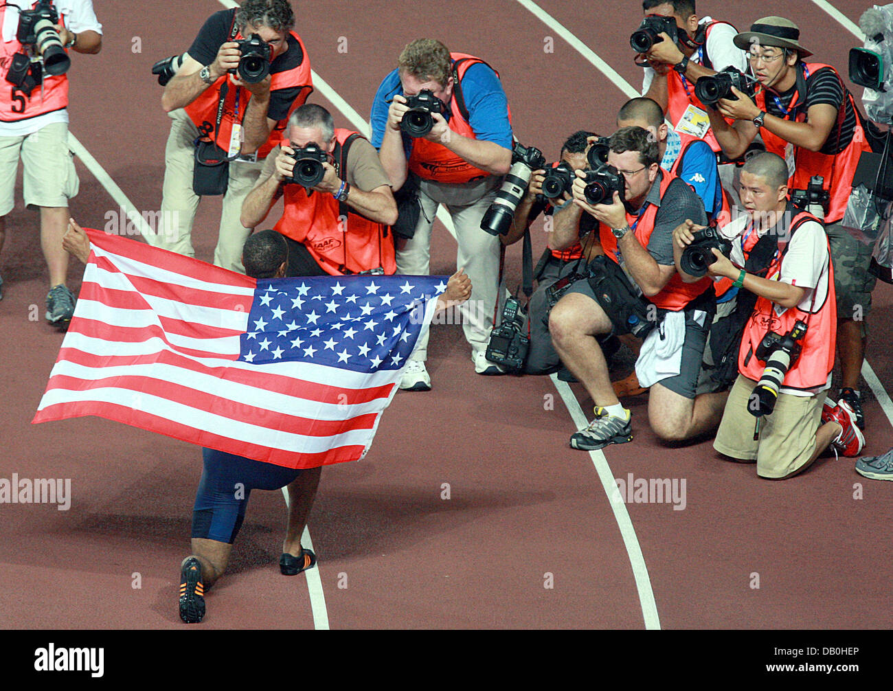 US American sprinter Tysoncelebrates with the US American flag US American sprinter Tysoncelebrates with the US American flag