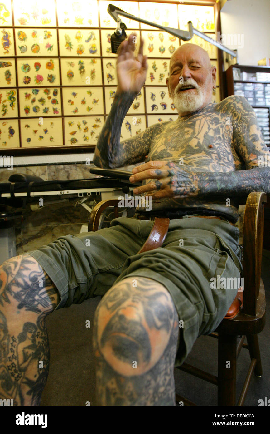 94-year-old Albert Cornelissen laughs in the oldest tattoo studio in ...