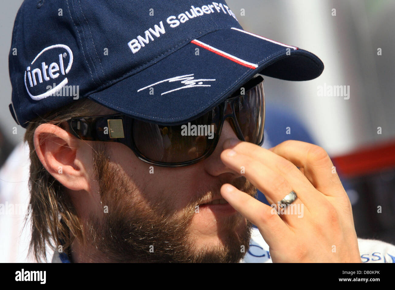 German Formula One driver Nick Heidfeld of BMW Sauber walks in the