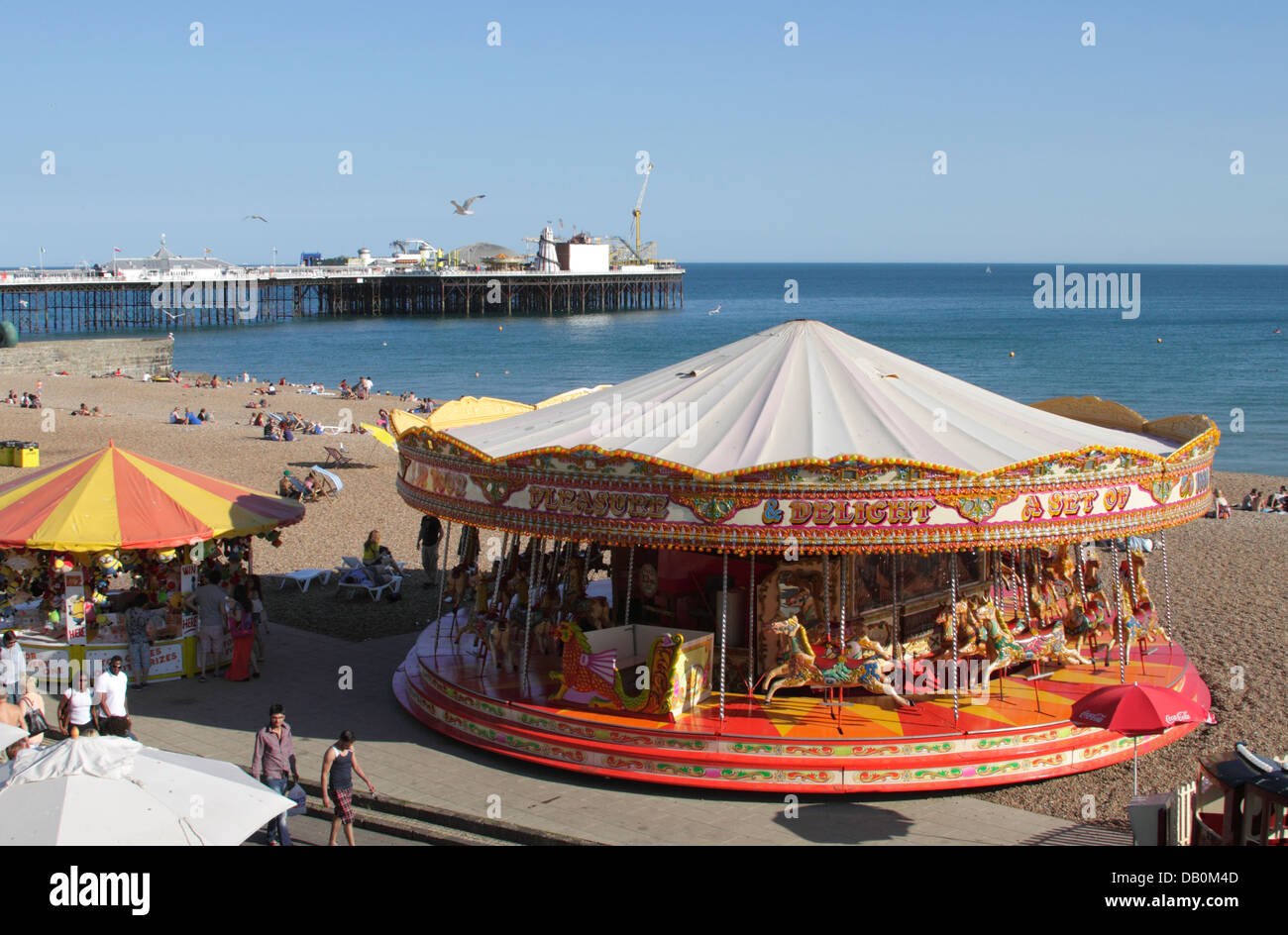 brighton-seafront-carousel-and-pier-hi-res-stock-photography-and-images