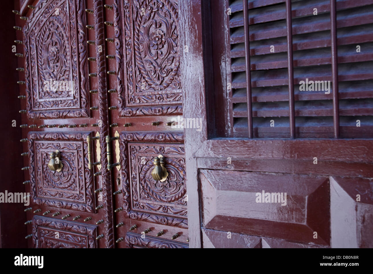 Ornately carved wooden doors, Al-Tayibat City Museum for International Civilisation in Jeddah, Saudi Arabia. Stock Photo