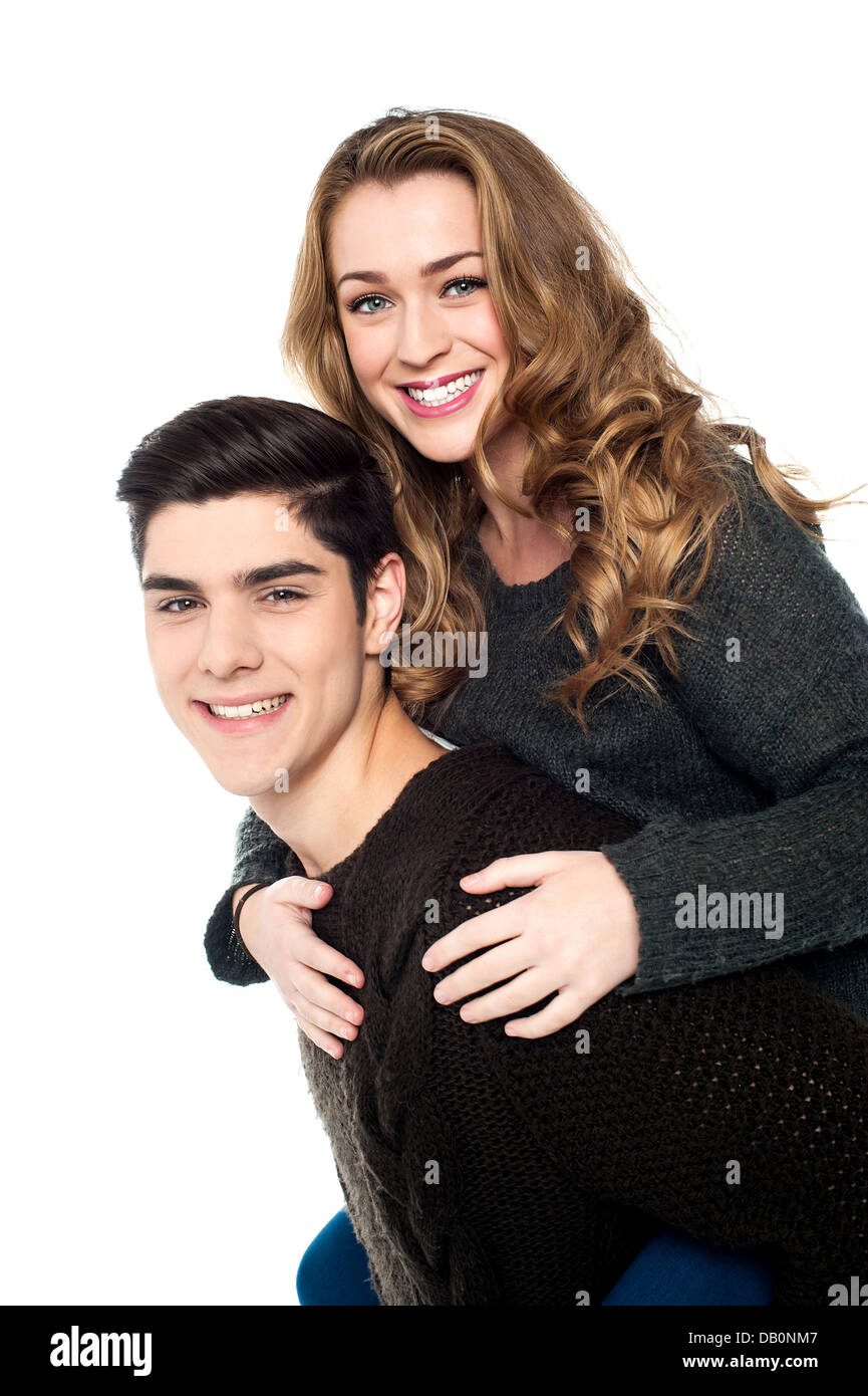 Girlfriend enjoying piggyback ride Stock Photo - Alamy