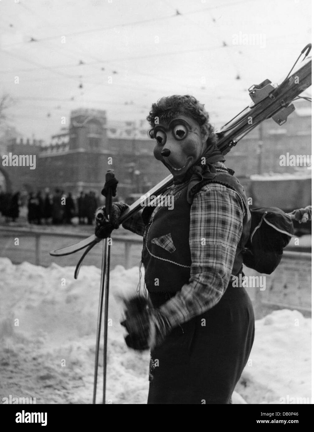 festivities, carnival, carnival reveller with Mecki mask and skis, Karlsplatz, Munich, 1950s / 1960s, Additional-Rights-Clearences-Not Available Stock Photo