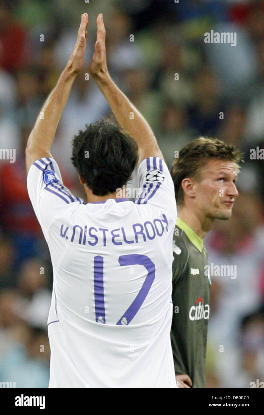 Real Madrid's striker Ruud van Nistelrooy cheers after scoring the