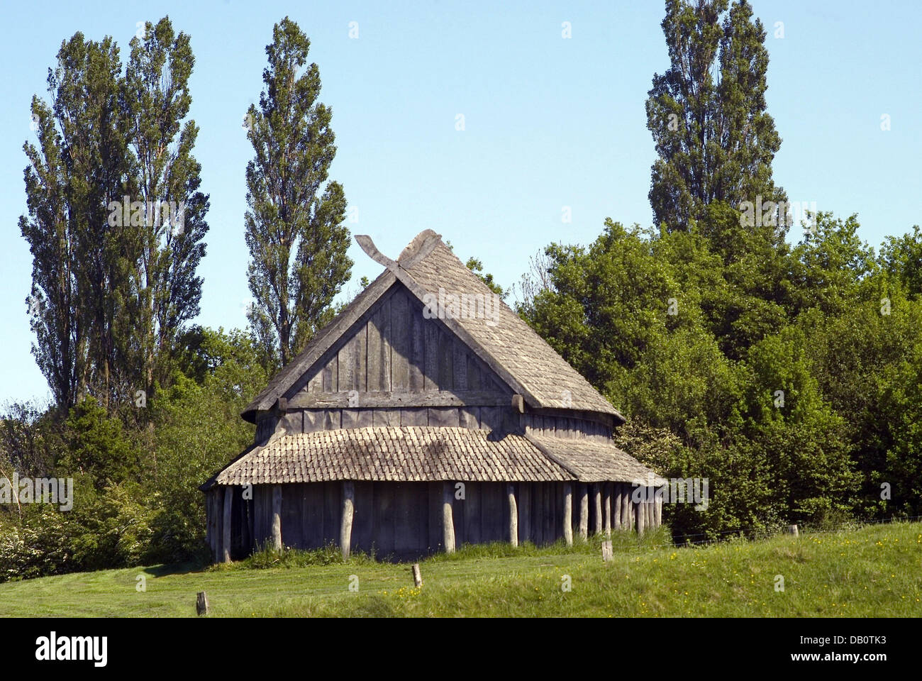 The photo depicts a typical Viking longhouse inside the fortified