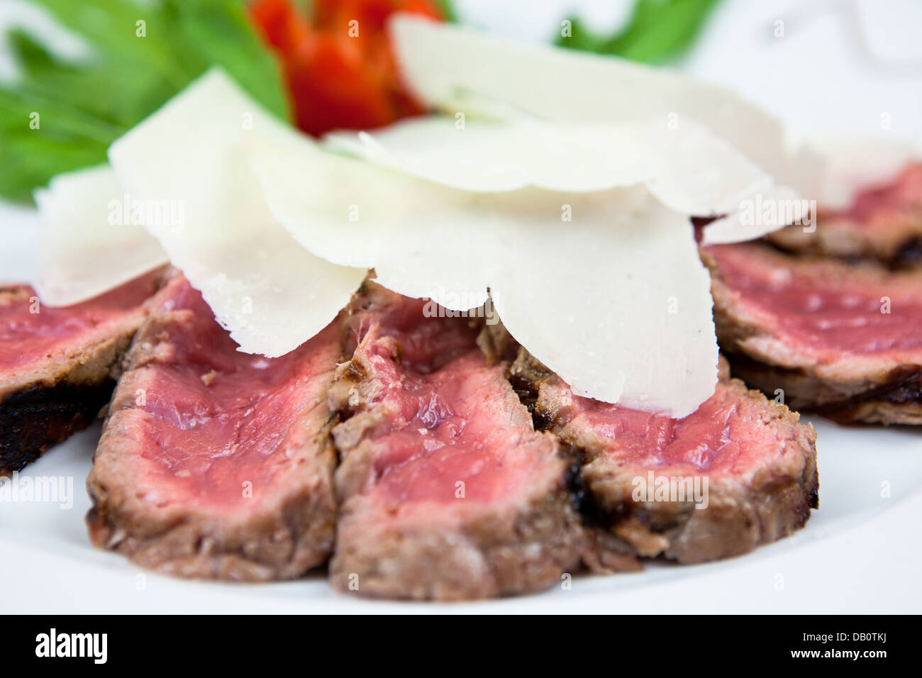 tenderloin with cheese, tomatoes and vegetables Stock Photo