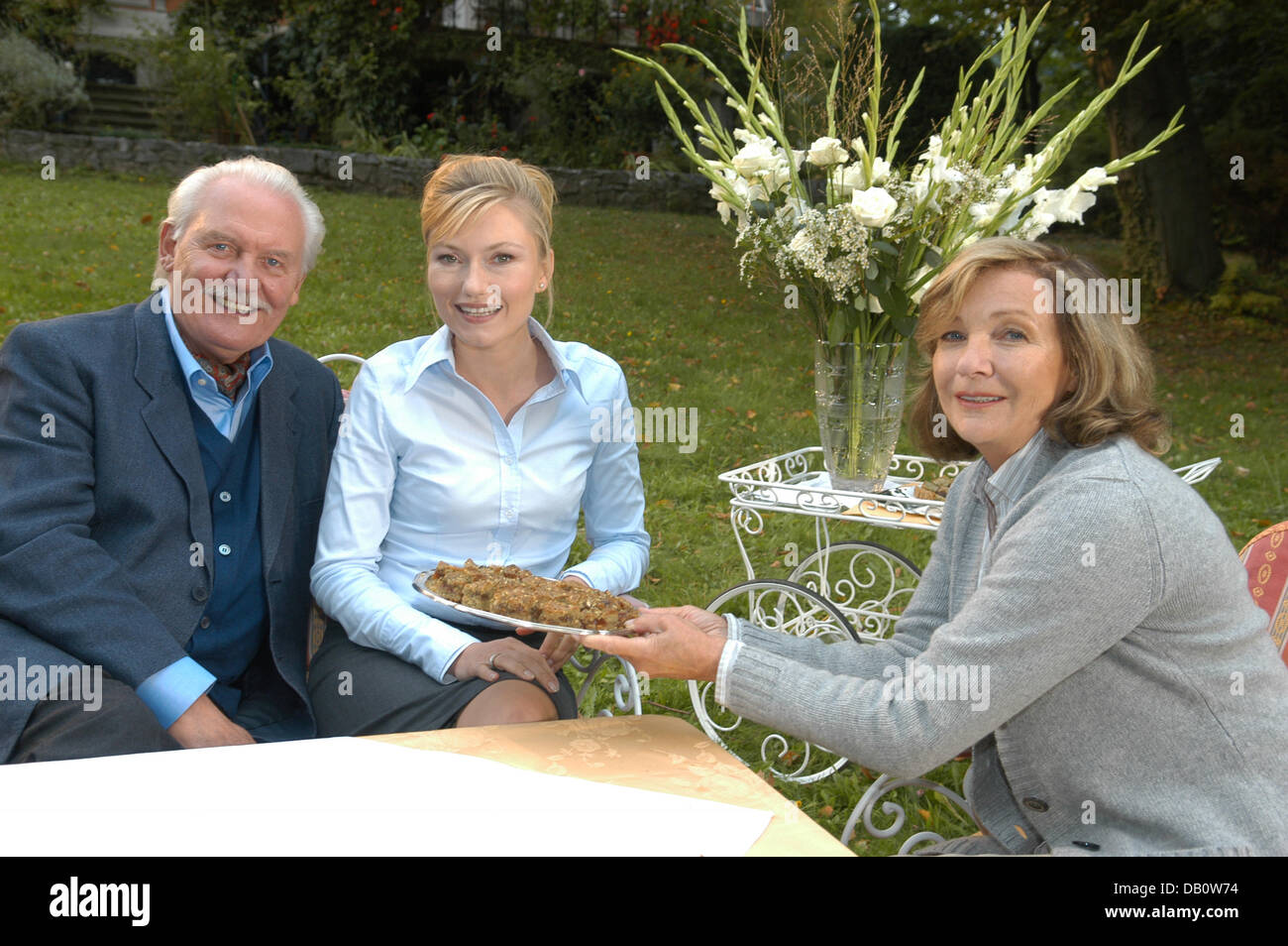 German actors (L-R) Wolfgang Huebsch as Herbert Reichenbacher, Johanna Christine Gehlen as Laura Althoff and Gila von Weitersahausen as Lotte Reichenbach pose during the shooting of TV sequel 'Lily Schoenauer: For ever and a day' in Deutschlandsberg, Austria, 26 September 2007. The TV film is a co-production of Bavaria Film, Graf Film, ARD/Degeto and ORF sponsored by the television Stock Photo