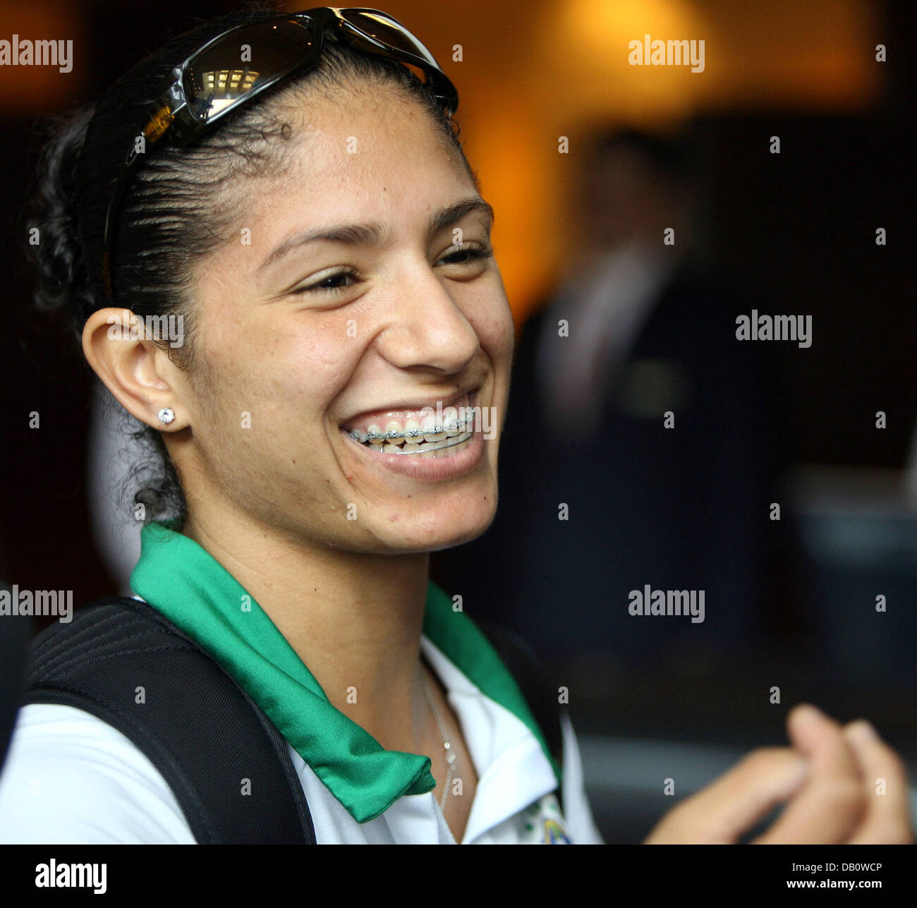 Brazilian international Cristiane shows them teeth and braces arrivoing to the team's hotel Pudong Shangri-La of Shanghai, China, 28 September 2007. Brazil faces Germany for the promising FIFA Women's World Cup Final on 30 September. Photo: Carmen Jaspersen Stock Photo