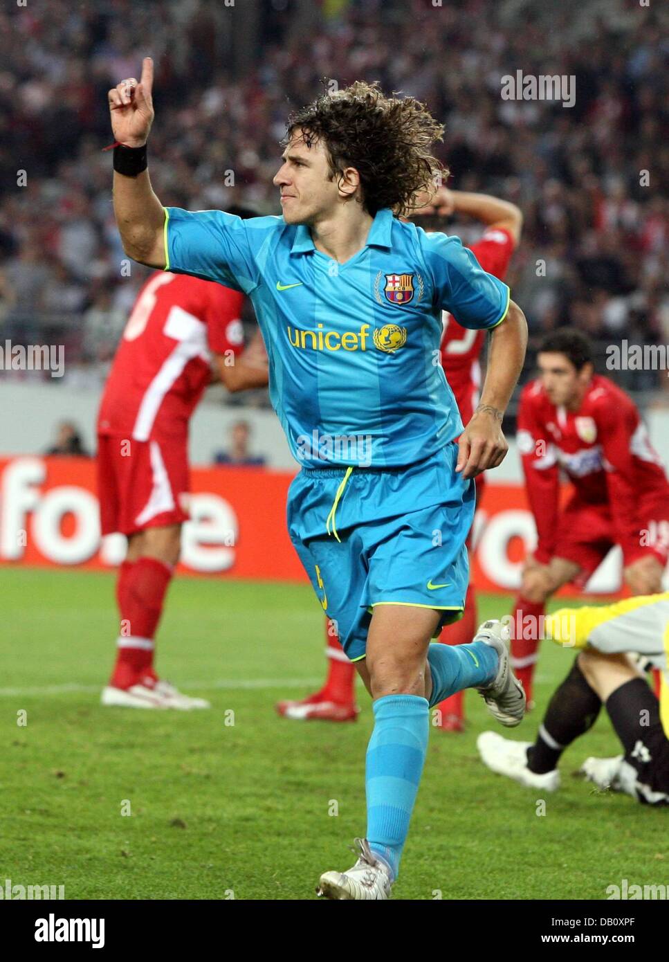 Barcelona's Carles Puyol cheers after scoring 1-0 during the Stuttgart vs. Barcelona Champions League match in Stuttgart, Germany, 02 October 2007. Photo: Bernd Weissbrod Stock Photo