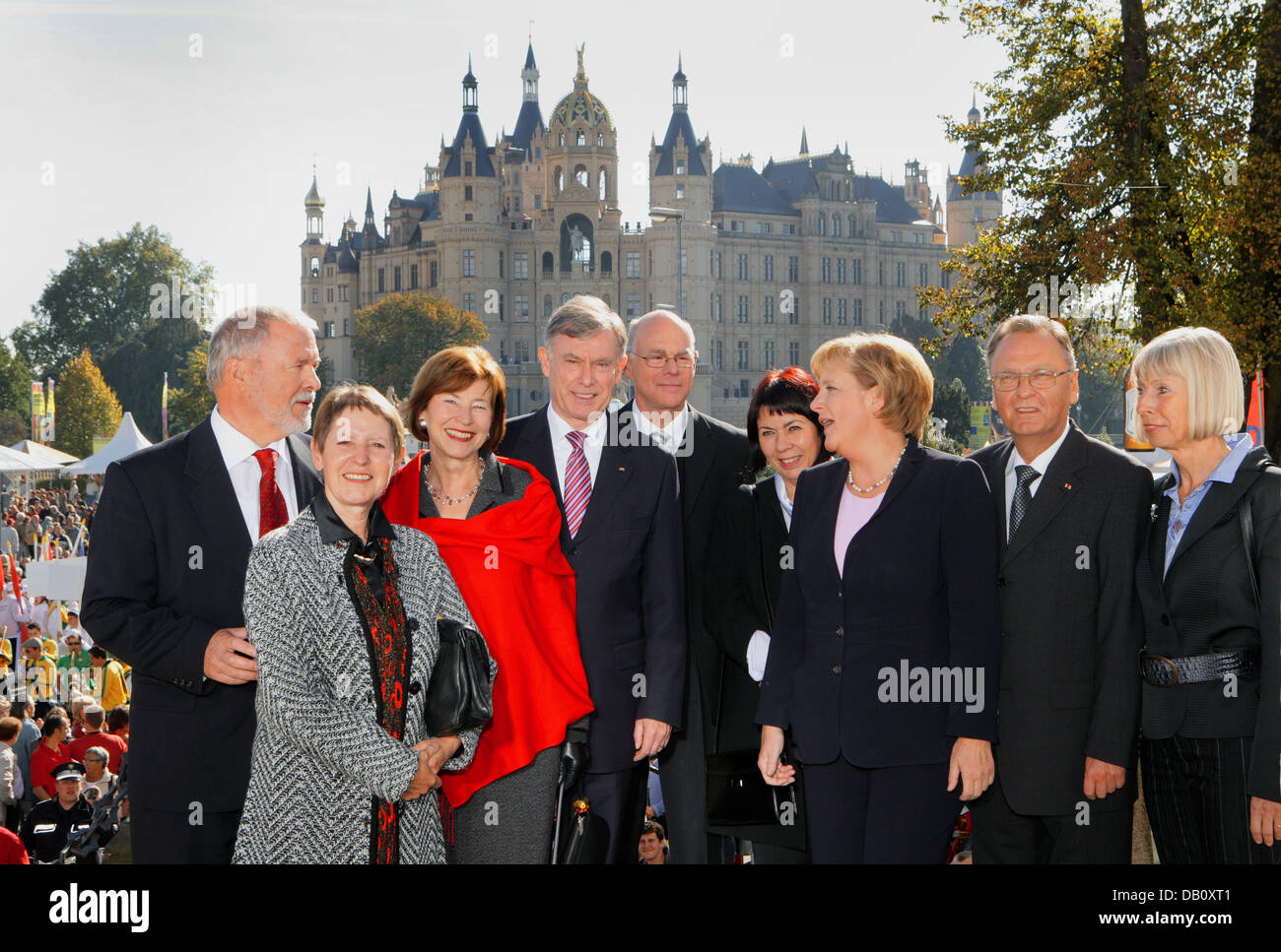 (L-R) The President of the German Bundesrat Harald Ringstorff with his wife Dagmar,the German President Horst Koehler with his wife Eva Luise, the President of the German Bundestag Norbert Lammert with his wife Gertrud, German Chancellor Angela Merkel, the President of the Federal Constitutional Court Hans-Juergen Papier and his wife Marianne pose for a group photo at the Palace in Stock Photo