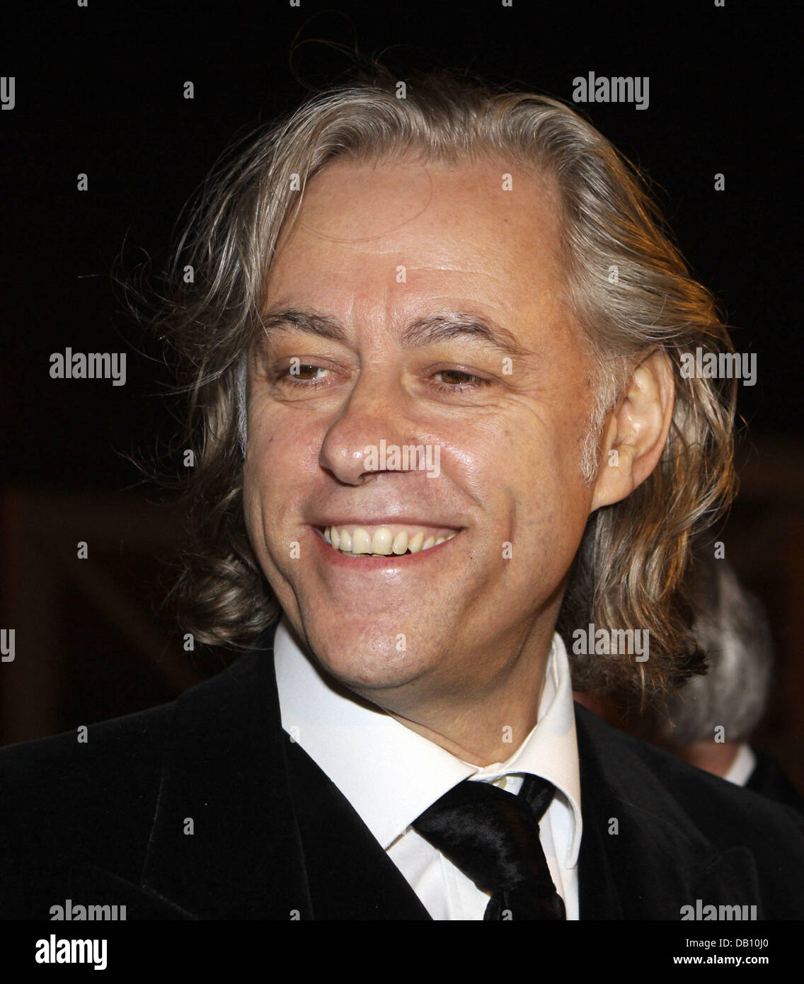 Irish musician Sir Bob Geldof smiles as he arrives for a gala night to
