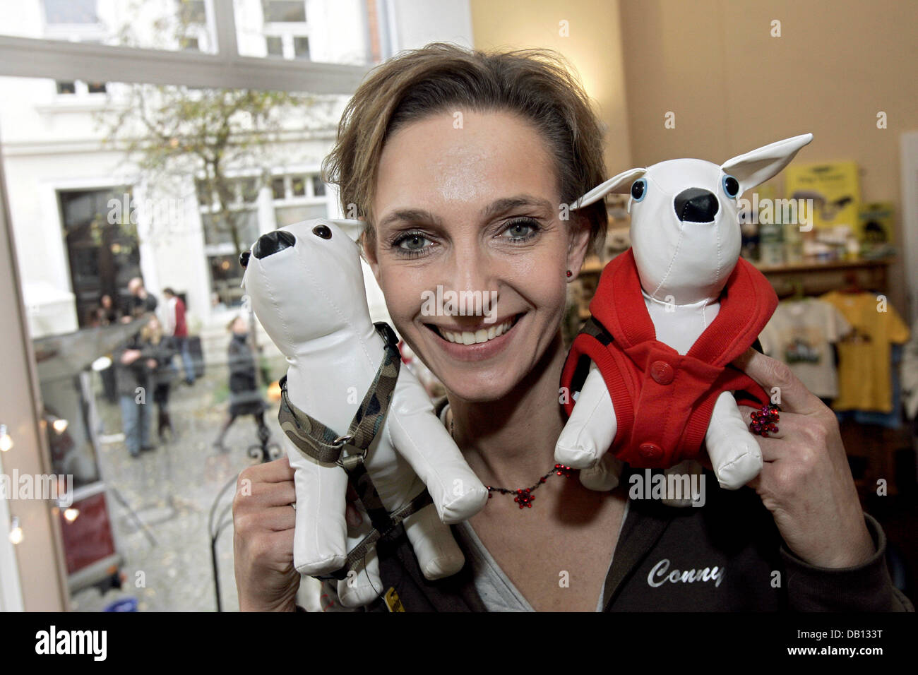 Actress Conny Niedrig poses with dog toys at the opening of her dog parlour in Essen, Germany, 28 October 2007. With the opening  of the shop a long entertained youth dream came true for Niedrig, who stars in the SAT1 serial ?Niedrig und Kuhnt?. Photo: Joerg Carstensen Stock Photo