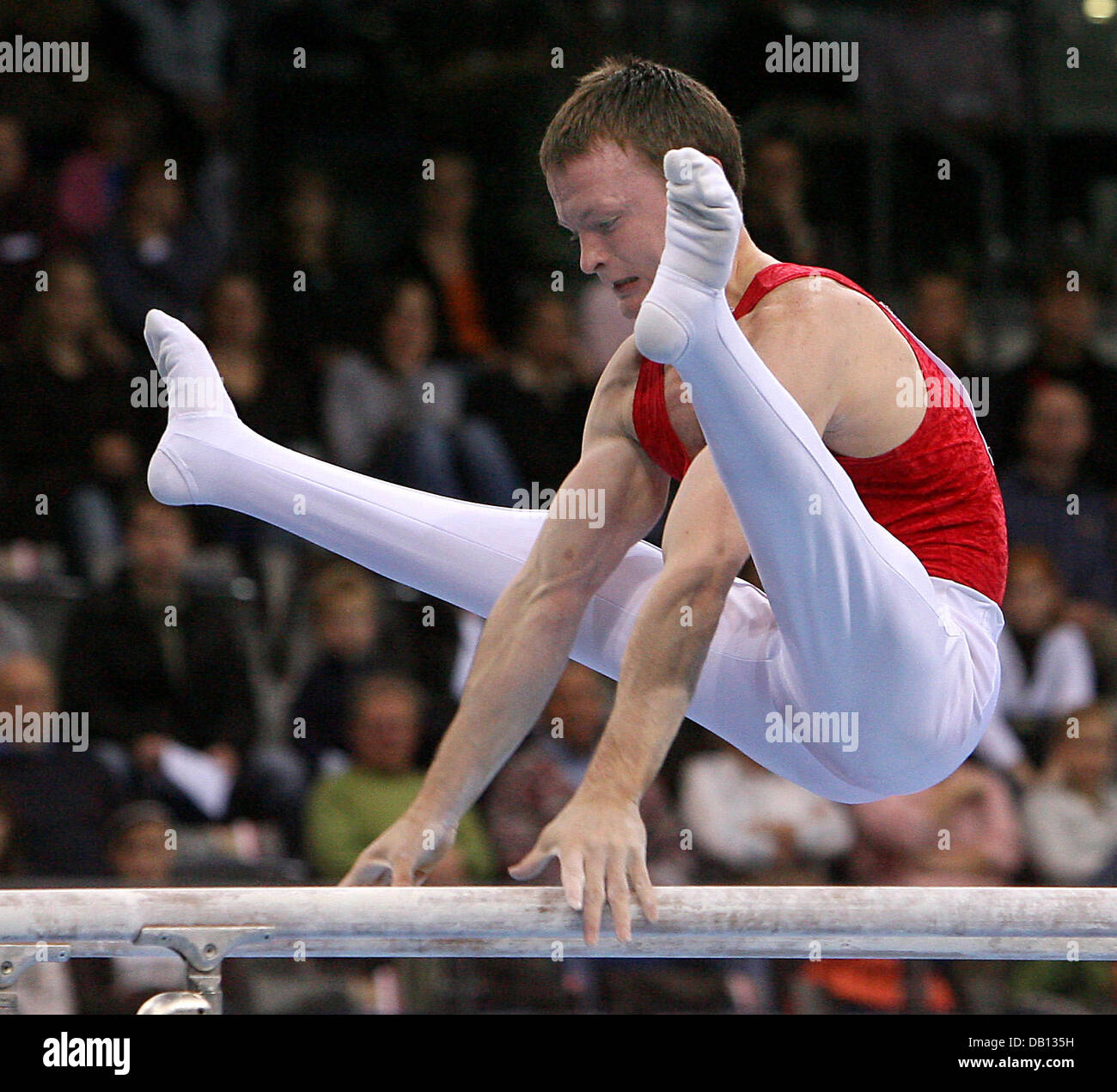 Uzbek Anton Fokin in action at the 25th DTB Cup in Stuttgart, Germany, 27 October 2007. Fokin finished second in the bars competition with 15.850 points. Photo: NORBERT FOERSTERLING Stock Photo