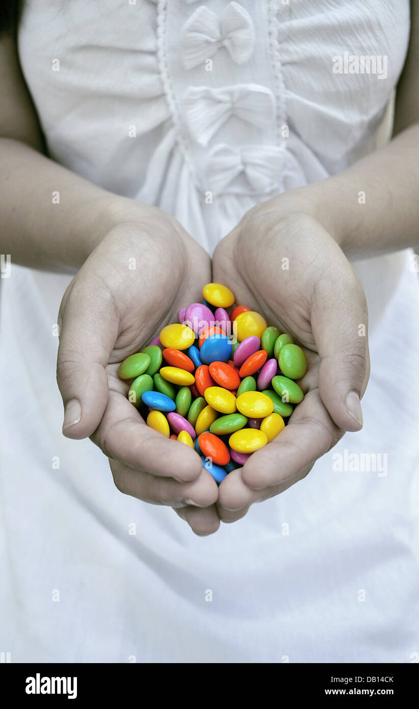 candy girl, women, human hand,Chocolate, Giving,Human Finger, White Stock Photo