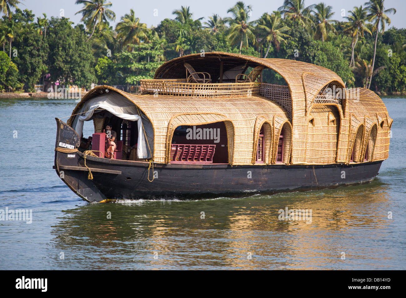 Rice boat cruise in the backwaters of Kerala, India Stock Photo