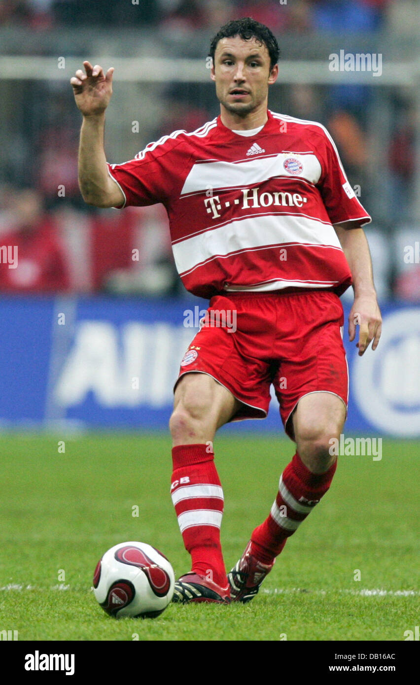 FC Bayern Munich player Mark van Bommel is pictured in action