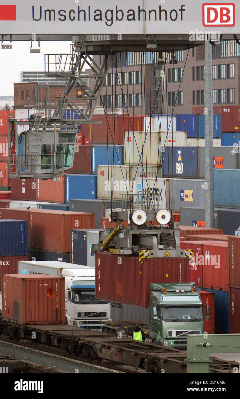 German Container Train Containers are transshipped from trains to lorries at the railway yard ...