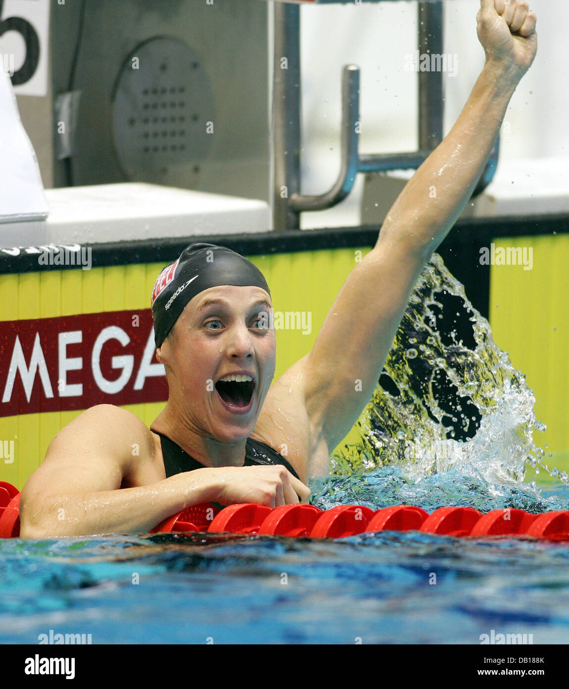 Dutch swimmer Marleen Veldhuis celebrates in the water after winning