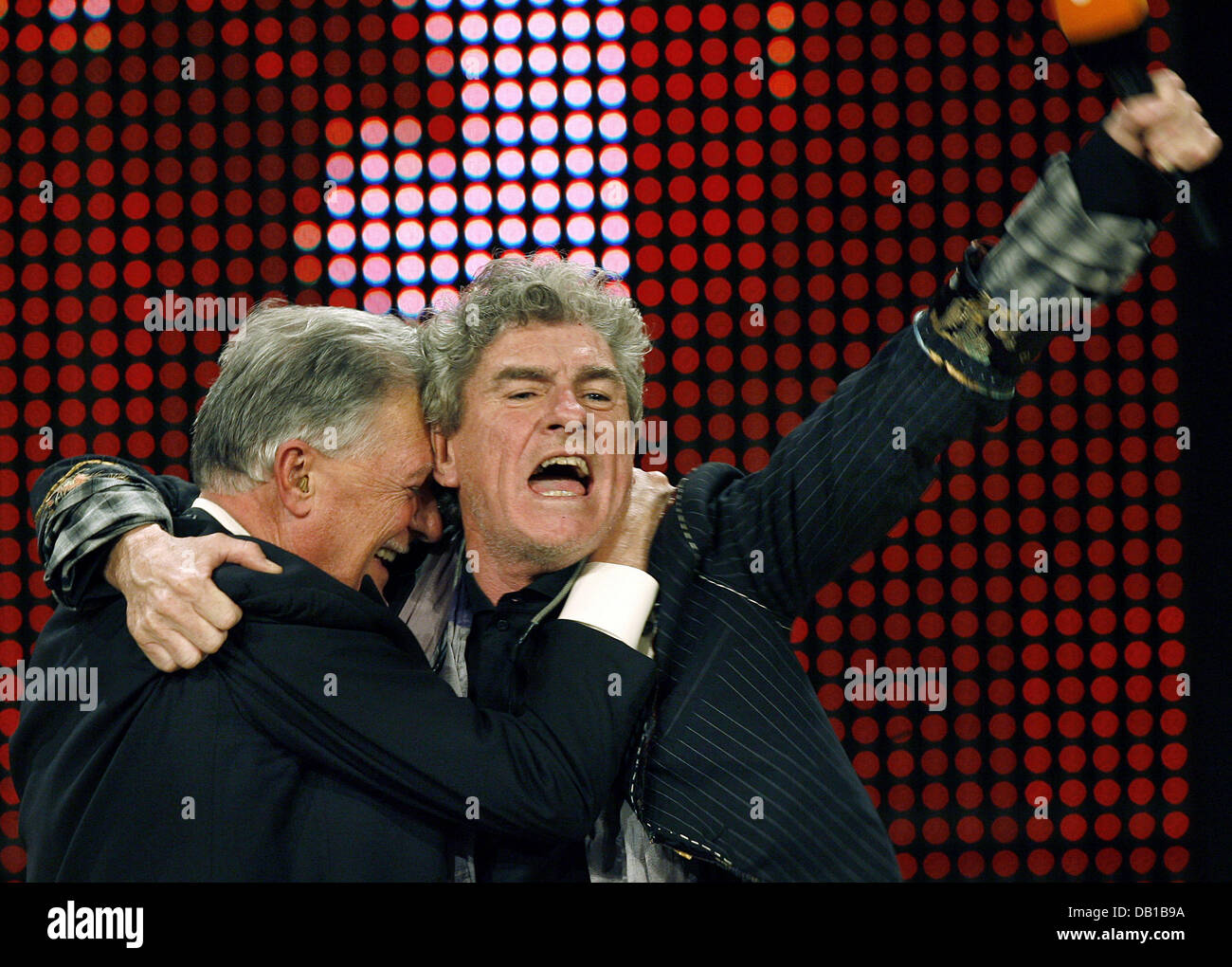 Australian cameraman Christopher Doyle (R) congratulates his German