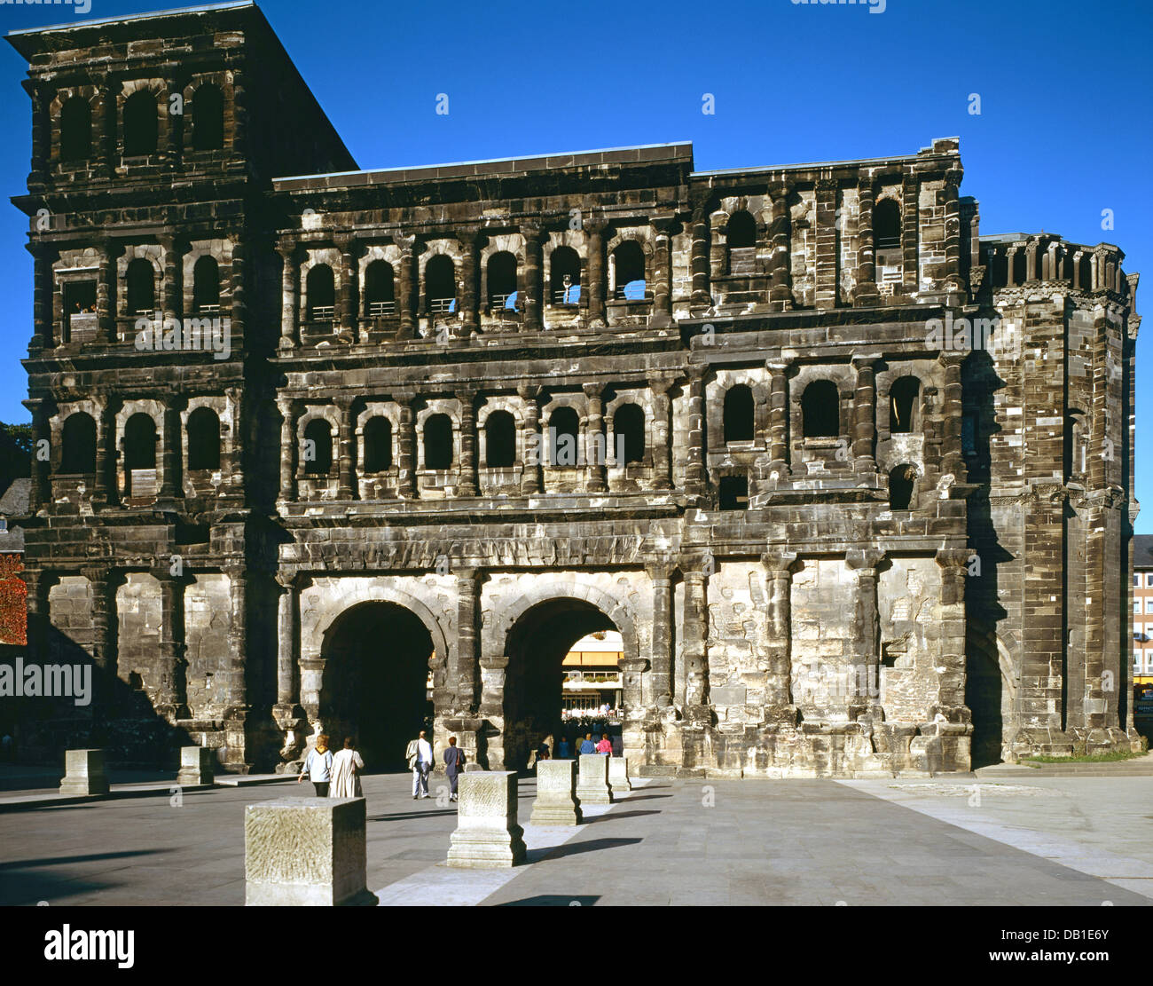 The picture shows the Porta Nigra (Black Gate), a Roman city gate in ...