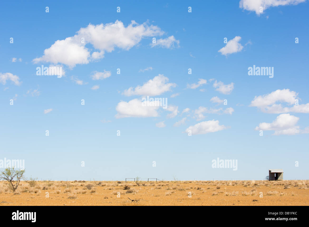Dry, barren ground in drought conditions in outback Queensland, Australia Stock Photo