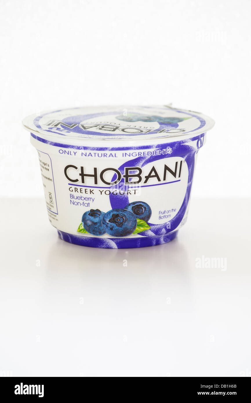 https://c8.alamy.com/comp/DB1H6B/a-container-of-chobani-blueberry-yogurt-on-a-white-cabinet-with-white-DB1H6B.jpg
