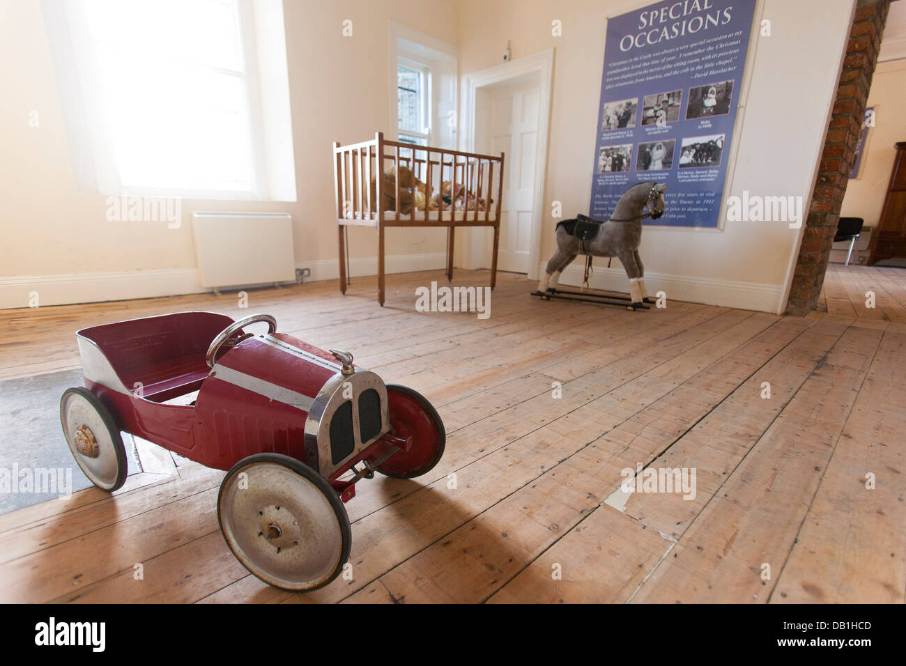 A childrens toy and play room in the living quarters interior of Enniscorthy Castle Museum in County Wexford, Ireland Stock Photo