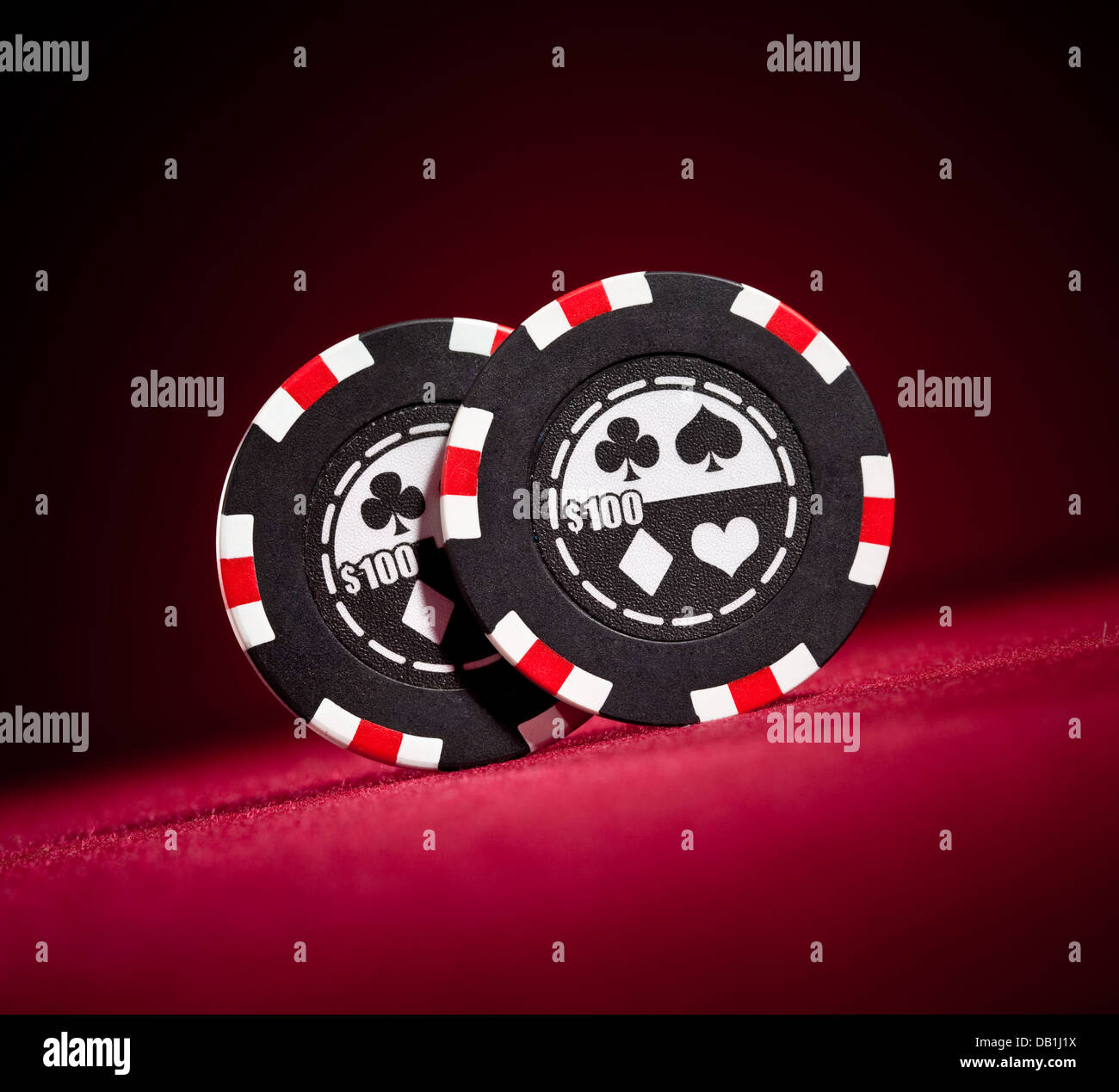 Casino gambling chips on the red Stock Photo