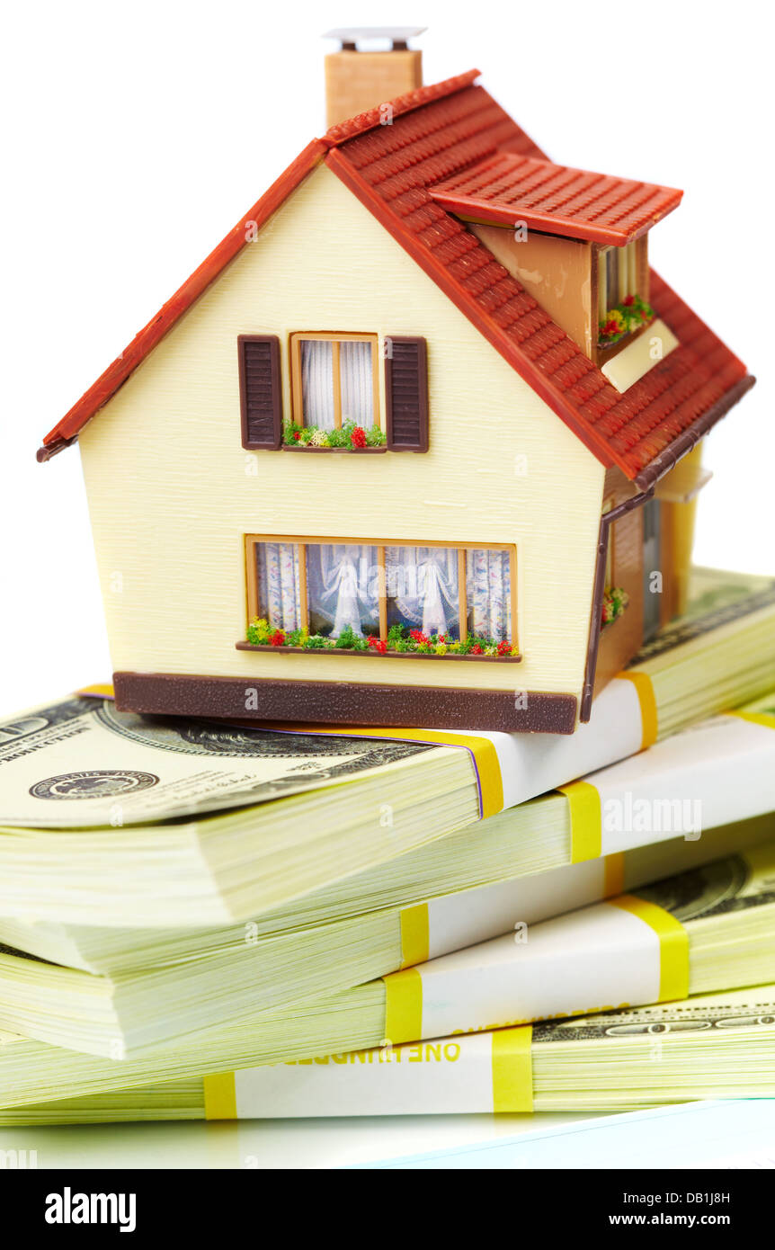 house on packs of banknotes Stock Photo - Alamy