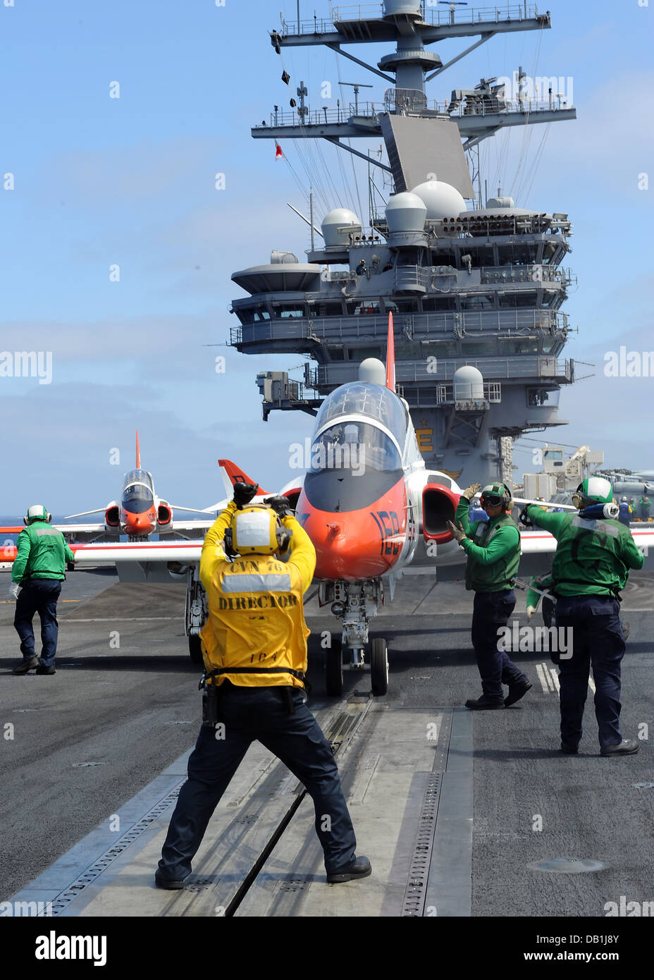 Aviation Boatswain's Mate (Handling) 3rd Class Gary Armstrong directs a