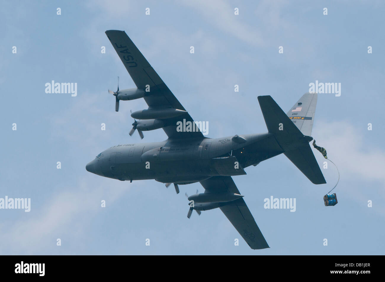 A C-130 from the 130th Airlift Wing drops a Container Delivery System bundle, during training event SENTRY STORM, July 17, 2013 Stock Photo