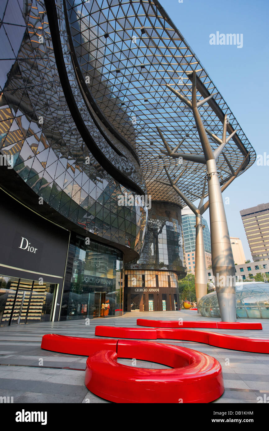 Vertical scene of Louis Vuitton's pop-up installation of red striking  shipping containers by Virgil Abloh's idea, at ION Orchard, Singapore Stock  Photo - Alamy