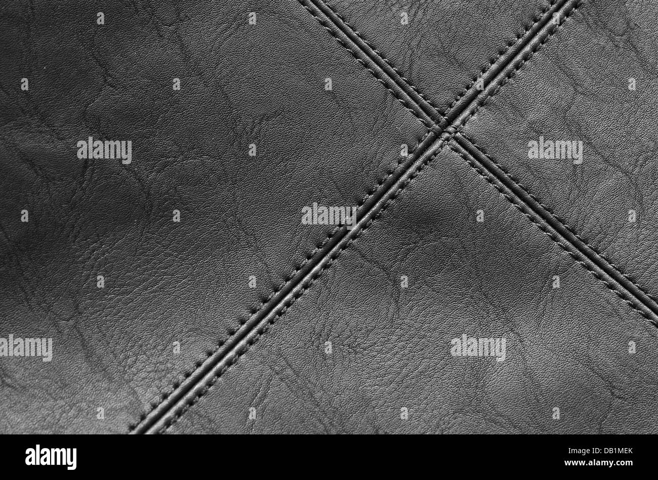 Detail of black leather with stitching in closeup Stock Photo Alamy